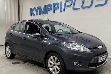 Ford Fiesta 1,25 82 hv Ghia M5 5-ovinen - Suomi-auto / Vakionopeudensäädin / AC / Lohkolämmitin